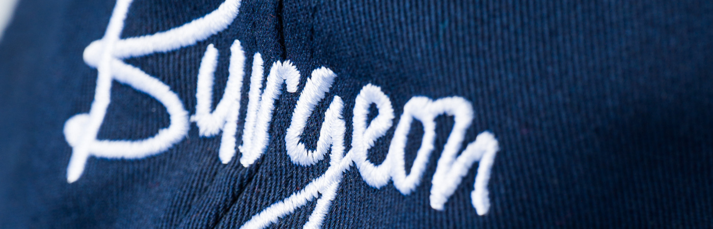 A closeup of the Burgeon Ball Cap in 'Pacific Blue.'