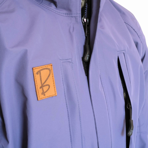 Chest Patch of Tuckerman Hardshell Jacket in Stone Blue