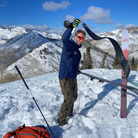 Skier wearing Men's Tuckerman Pants in 'Olive.'