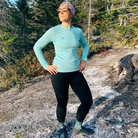 Women's Hiking Leggings in Black being worn by a hiker.