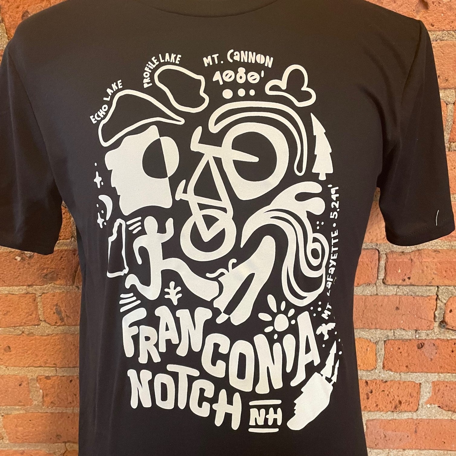 Unisex Franconia Notch T-Shirt in Black.